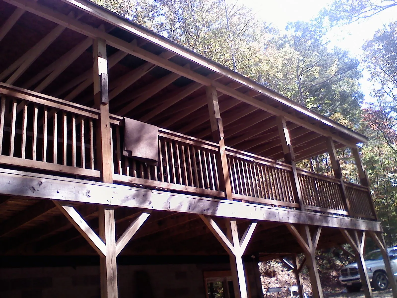 Timber framing under a new elevated porch and deck — Roof Leak Repair in Vance by Roofing Brothers